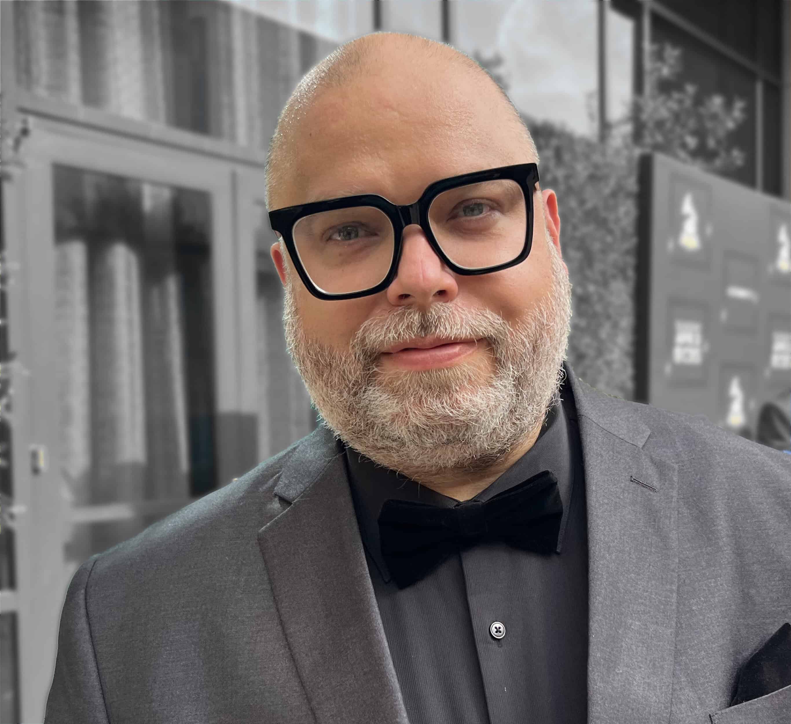 Jon Rezin holding Grammy